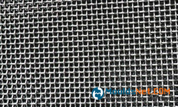 A piece of stainless steel plain weave woven wire cloth.