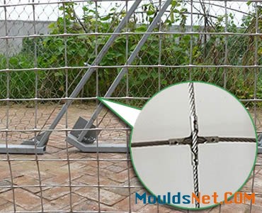 A piece of installed stainless steel square rope mesh with cross-shaped ferrules.
