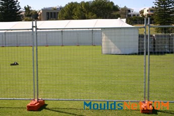 Three welded portable fences are installed on the grassland.