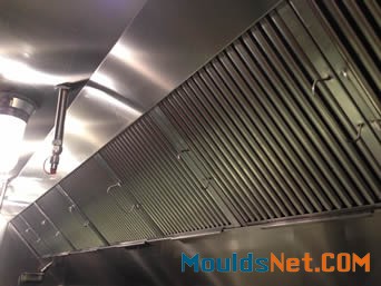 Several handled grease baffle filters come in line to work in restaurant kitchen